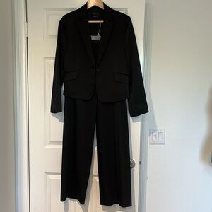 Beautiful BCBG MaxAzria black pantsuit, jacket size medium, slacks size 2